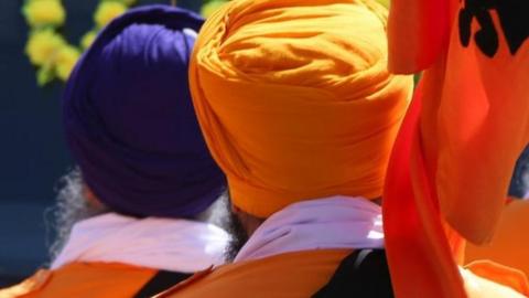 Sikhs walking in procession