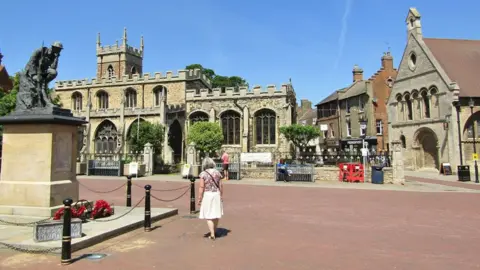 Geograph/Colin Smith Huntingdon's town square showing All Saints' Church and the Cromwell Museum on the right