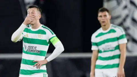 Celtic captain Callum McGregor looks dejected