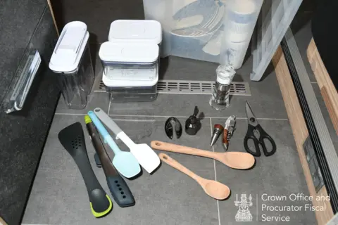 COPFS An assortment of kitchen utensils.