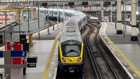 South Western Railway A blue train departing platform 2 at London Waterloo.