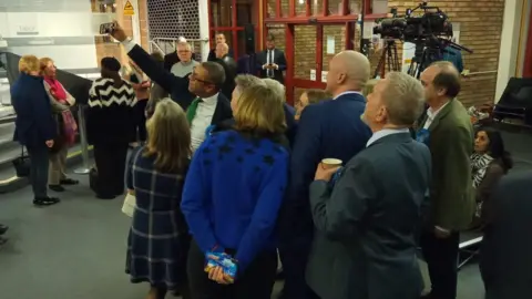 BBC James Cleverly takes a selfie