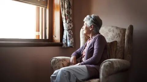 Getty Images Woman on own