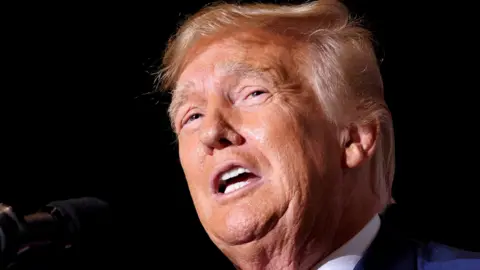 Reuters Former US President Donald Trump speaks at a campaign event in Iowa on 7 July