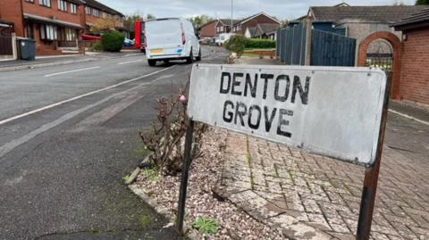 A road sign for Denton Grove, Weston Coyney