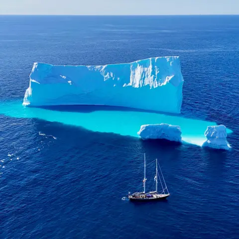 Northwest Passage Ocean Science Expedition The Abel Tasman navigating around an iceberg in Disko Bay, near Greenland.