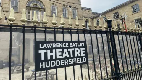 Sophia Luis-Hobbs/BBC A sign saying Lawrence Batley Theatre Huddersfield.