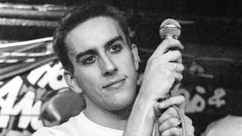 Getty Images Terry Hall of The Specials performing at the Hope & Anchor pub in Islington in London in November 1980