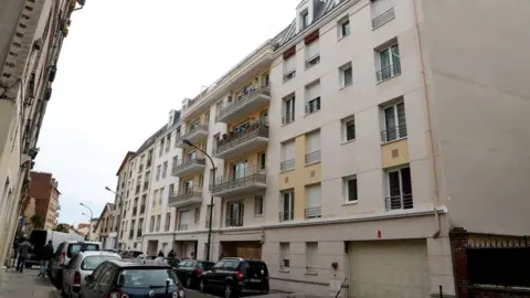 AFP Apartment building in Asnières-sur-Seine where Félicien Kabuga was arrested by French gendarmes (16 May 2020)