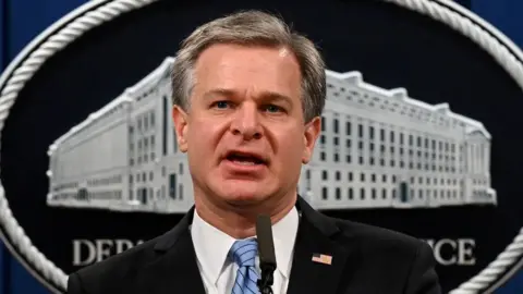 Reuters FBI Director Christopher Wray speaks during a press conference on a national security matter at the Department of Justice in Washington