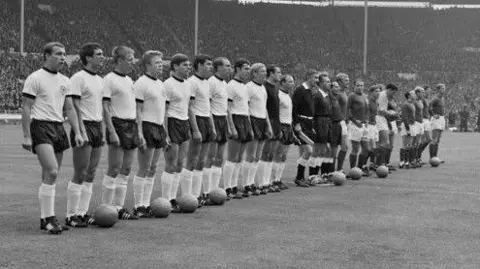 Getty Images The sides lined up ahead of the 1966 World Cup Final that England won 4-2