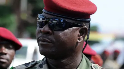 Guinea's military ruler Captain Moussa Dadis Camara aide Captain Jean Claude Pivi known as Coplan attends on October 2, 2009 at the Martyrs Square of Conakry during ceremonies marking he 51st anniversary of independence days.