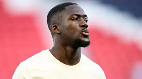 Ibrahima Konate at the Parc des Princes before Liverpool's Champions League quarter-final against PSG
