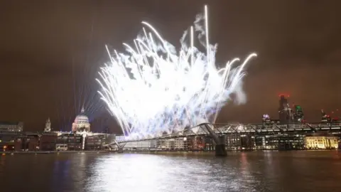 PA Media Fireworks on the Millennium Bridge