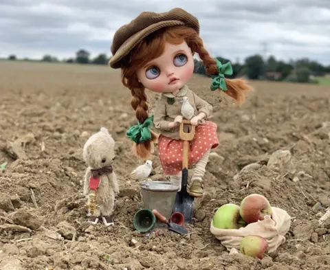 Eileen Lam One of the dolls and Ted on a farm