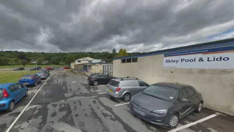 Google Cars parked in the car park at Ilkley Pool and Lido