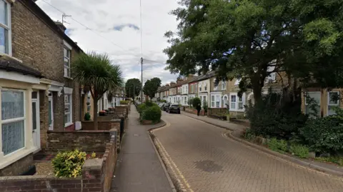 Google Brereton Road in Bedford, a standard residential street with houses on both sides and a traffic calming bend in the road