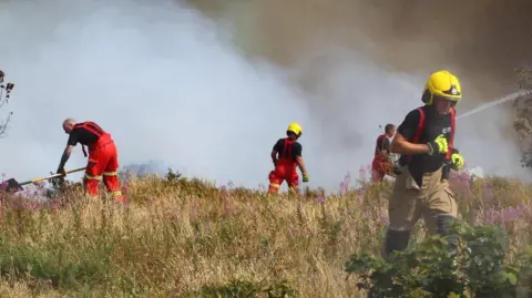 Firefighters tackling the blaze at Headon Warren.