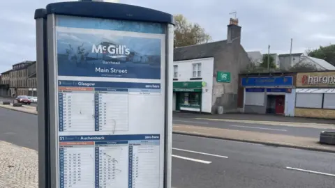 BBC McGills bus sign on Main Street, Barrhead