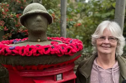 Vikki Upton Margaret Upton with her Remembrance Day topper