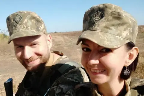 Valeria Subotina Andriy and Valeria in military uniform