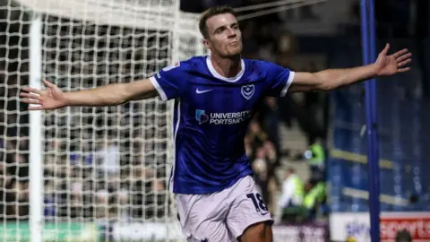 Conor Shaughnessy of Portsmouth celebrates after scoring a goal