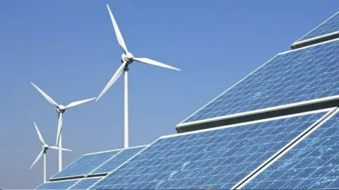 Getty Images Wind turbines and solar panels 