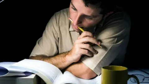 Thinkstock A university student studying for an exam