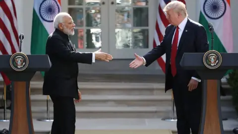 AFP US President Donald Trump and Indian Prime Minister Narendra Modi shake hands