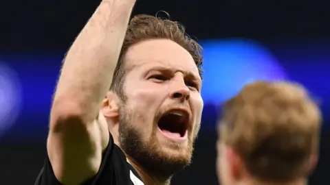 Daley Blind celebrates Ajax's victory over Tottenham