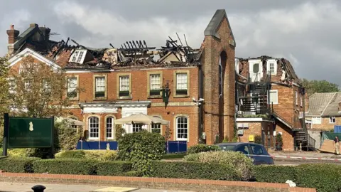 Andrew Parson King's Hotel after a fire