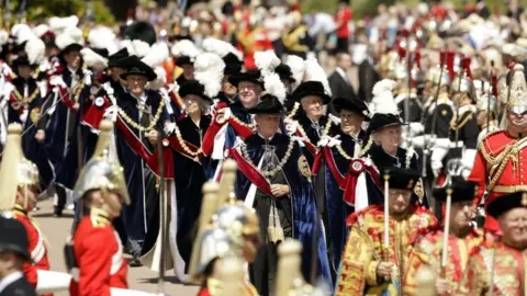 Getty Images Knights of the garter parade through crowds in Windsor