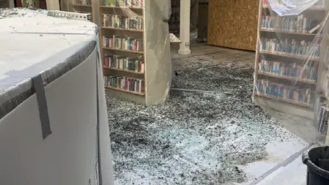 Nottinghamshire County Council Broken glass on the floor of the library