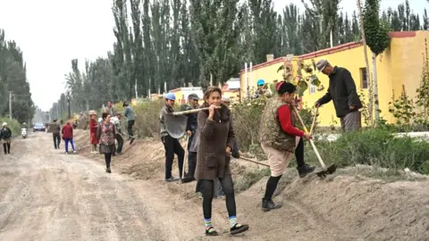 AFP Uighur people in Shayar village, Xinjiang