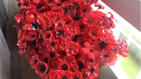 St George’s Church, Tredegar A bunch of painted poppies made from plastic bottles