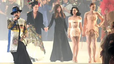 Getty Images Boy George performs on stage