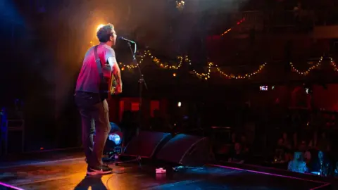 PA Media Frank Turner performs at The Clapham Grand