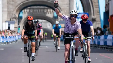 London Marathon Events Cyclists on Tower Bridge