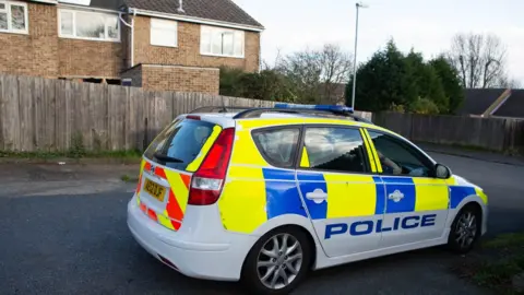 Terry-Harris.com Police car in Wykes Road, Yaxley