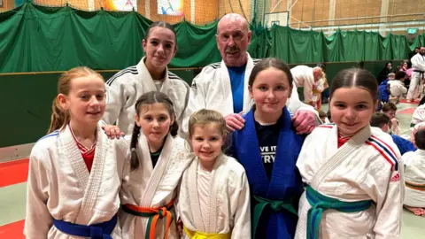 Harry and young judo players 