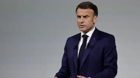 France's President Emmanuel Macron delivers remarks during a press conference 
