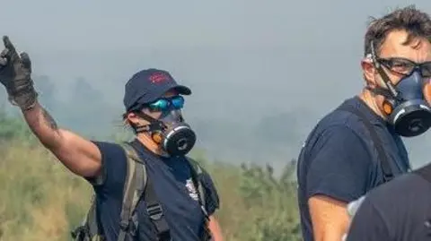 Firefighters on moorland