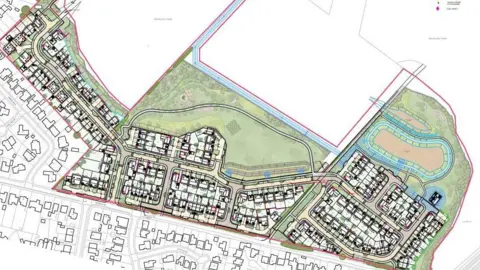 An artist image of a proposed housing development showing housing plots and roads