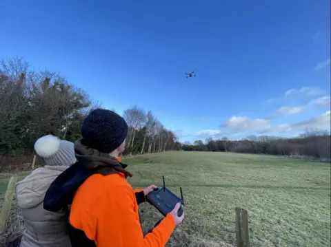 Manx Wildlife Trust People using a drone at the Curraghs