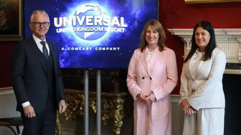 Reuters British Chancellor of the Exchequer Rachel Reeves and Secretary of State for Culture, Media and Sport Lisa Nandy pose with Comcast NBCUniversal's Universal Destinations & Experiences Chairman and CEO Mark Woodbury