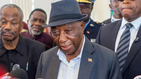 Executive Mansion - Liberia / Facebook A close-up of President Joseph Boakai wearing a hat