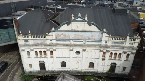 Mark Jenkinson The outside of the white theatre