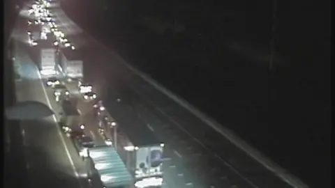 A traffic camera image of traffic queued on the M25.