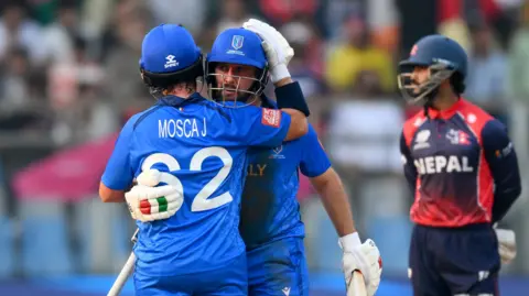 Italy batters celebrate