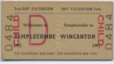 Tom Carswell A brown paper ticket stub, which has journey details on, with the ticket number 0484.